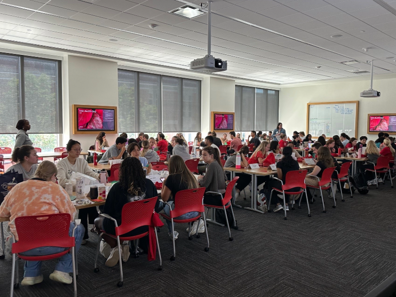 Students are meeting in groups with community resources
