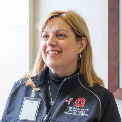 Ohio state university educator standing in a classroom
