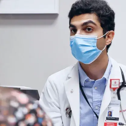 Practitioner consulting with a patient