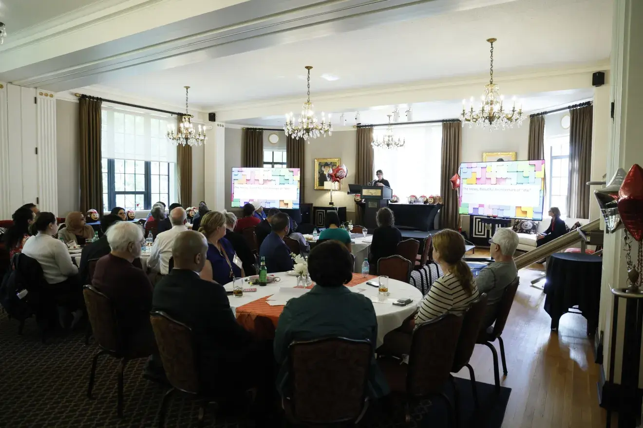 Attendees at the 2026 Excellence in Collaborative Action Awards listen to the keynote speaker