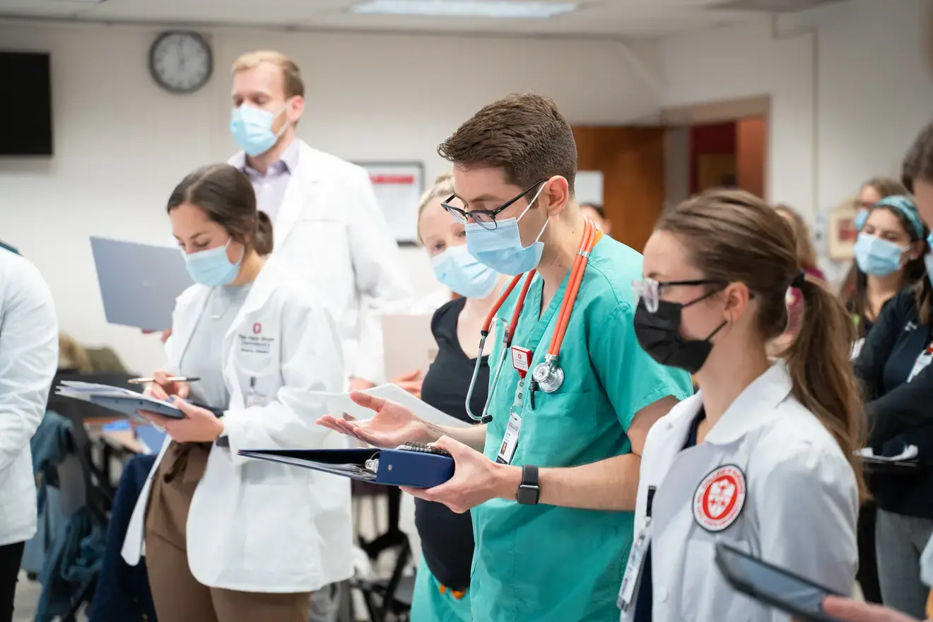 Medical students participating in a discussion at an eclipse meeting