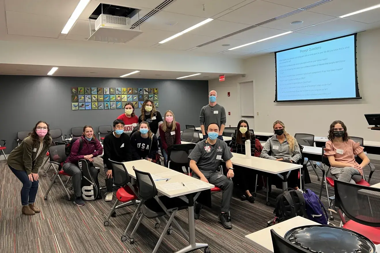 A group of people in a room at a SAB networking event