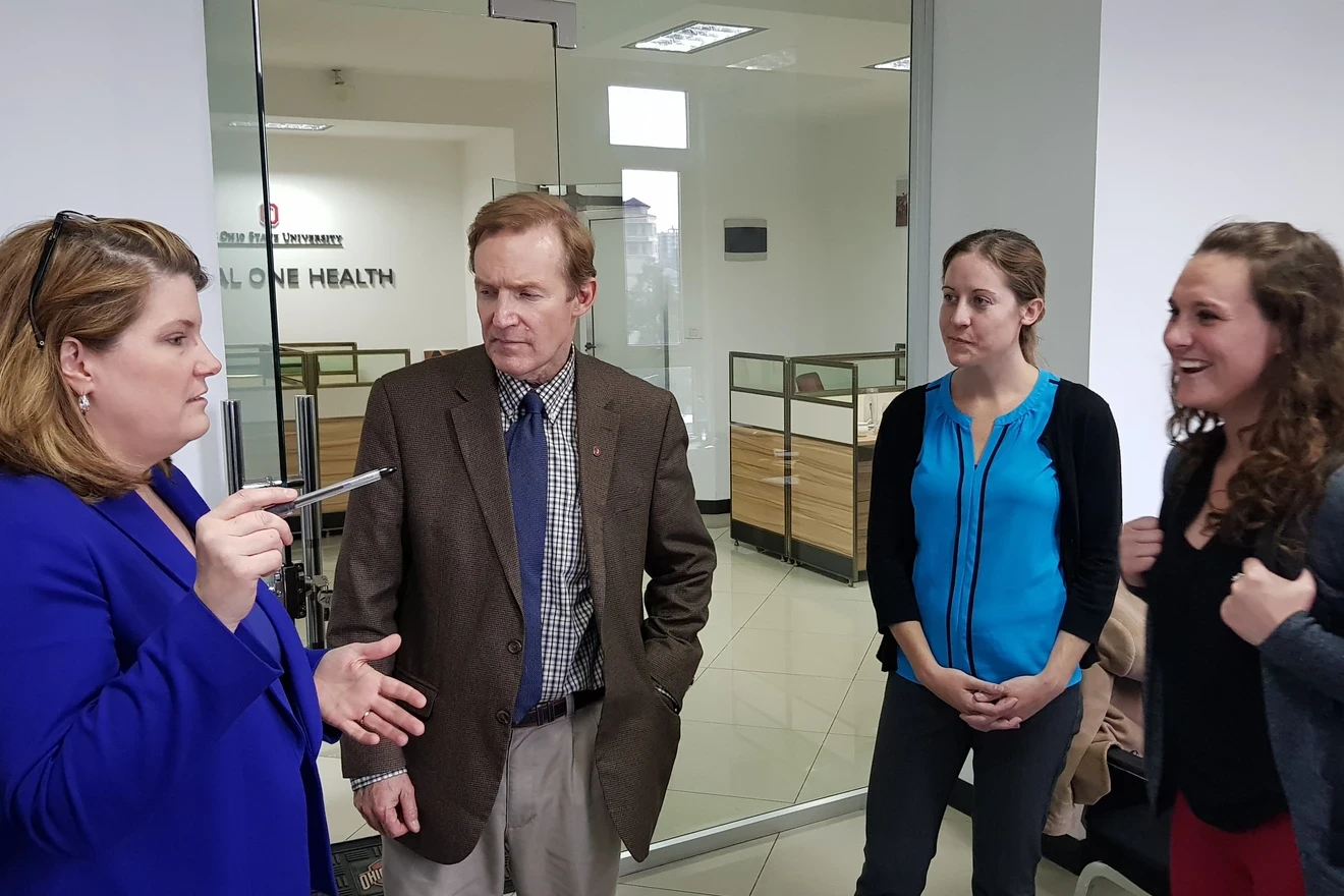 A team meeting outside of the Global one Health office