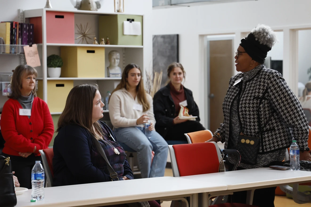 Community Health Mentor Speaking to Students and Faculty