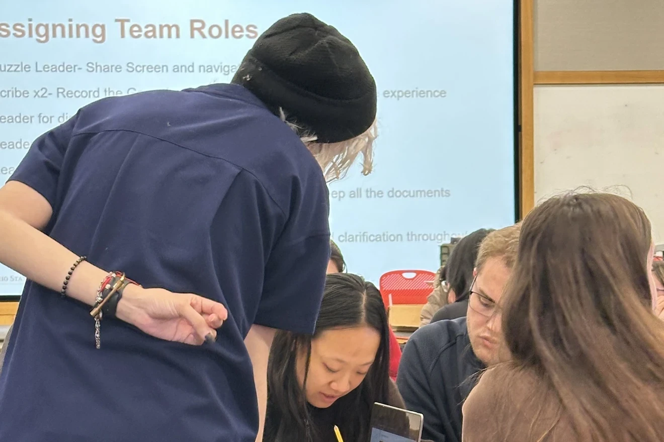 A teacher and a student are learning together